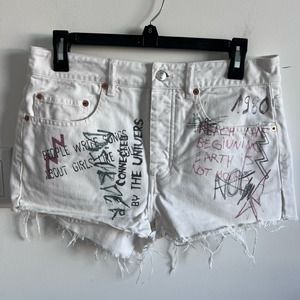 White Jean Shorts with Distressed Details and Raw Hems